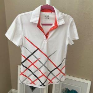 Woman white color graphic polo shirt.